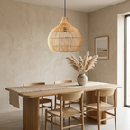 Retro rattan pendant light above an oak dining table in a Japandi dining room