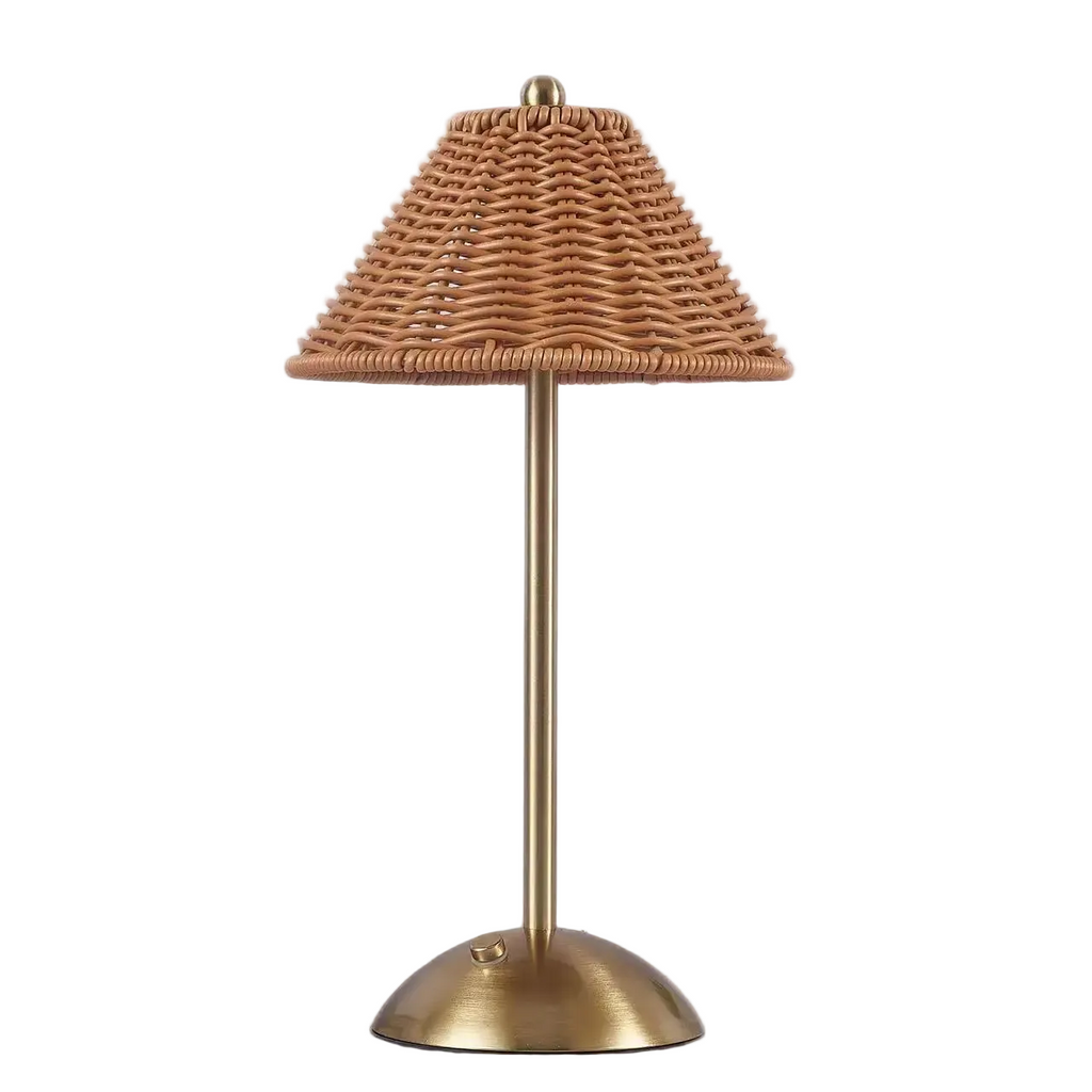 Cordless rechargeable rattan-effect table lamp with brass stand on a white background – Maison Liane