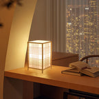 Andon bamboo table lamp glowing in the evening